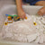 Let your child pretend to be a paleontologist with this dinosaur fossil excavation sensory activity.